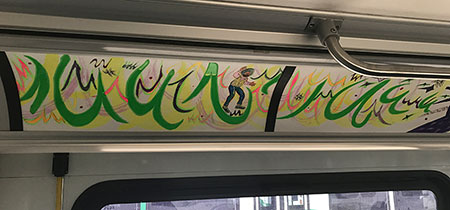 Photo: Ahkami painting on ART bus