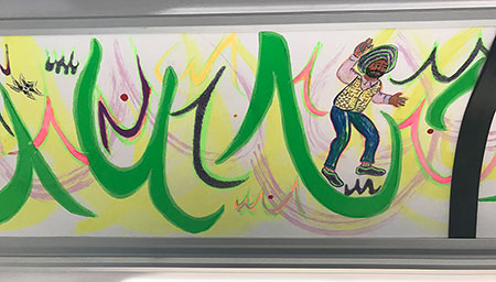 Photo: Ahkami painting on ART bus